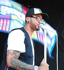 Travie McCoyProfile, Photos, News and Bio