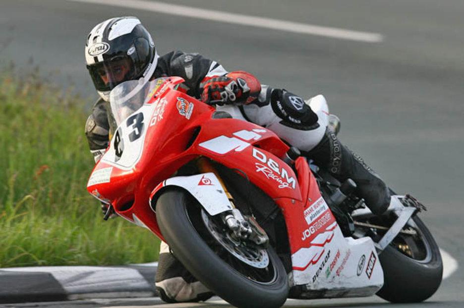 Isle of Man TT: Michael Dunlop races to victory after Ian Hutchinson rushed to hospital