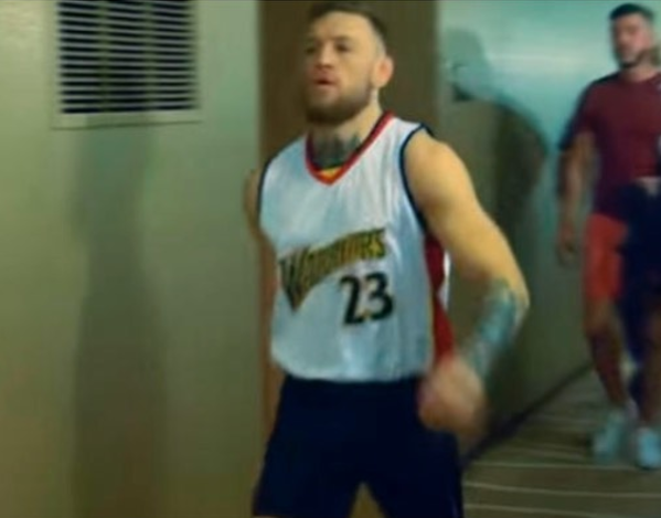 Conor McGregor taunts Floyd Mayweather over his domestic abuse conviction by wearing CJ Watson basketball jersey