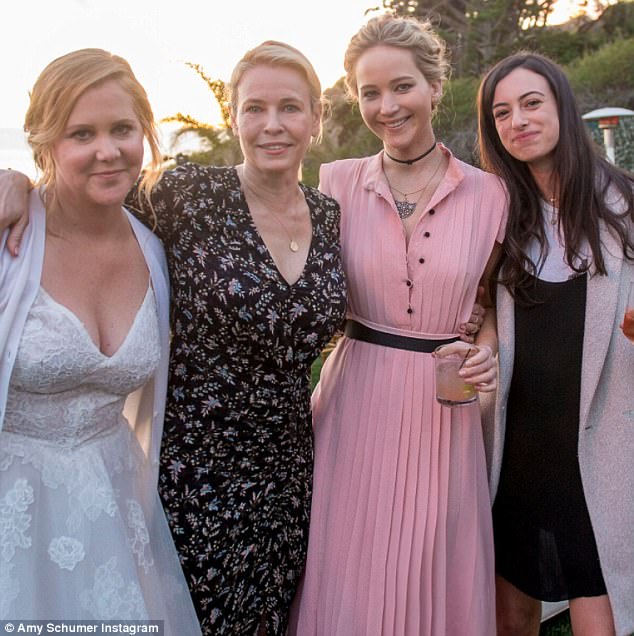 New BFFS! Jennifer Lawrence chats up Chelsea Handler during Amy Schumers surprise Malibu wedding