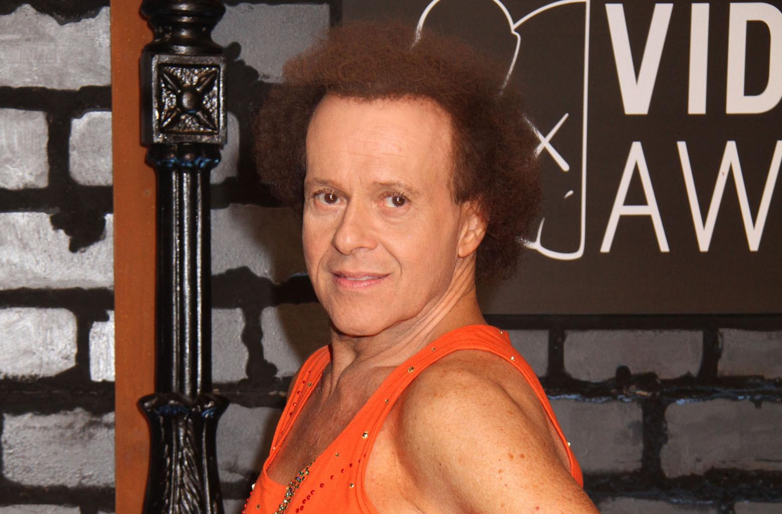 Richard Simmons      '  Reclusiveness Due To Knee Injury, Claims Friend, Insists He       's        Perfect        