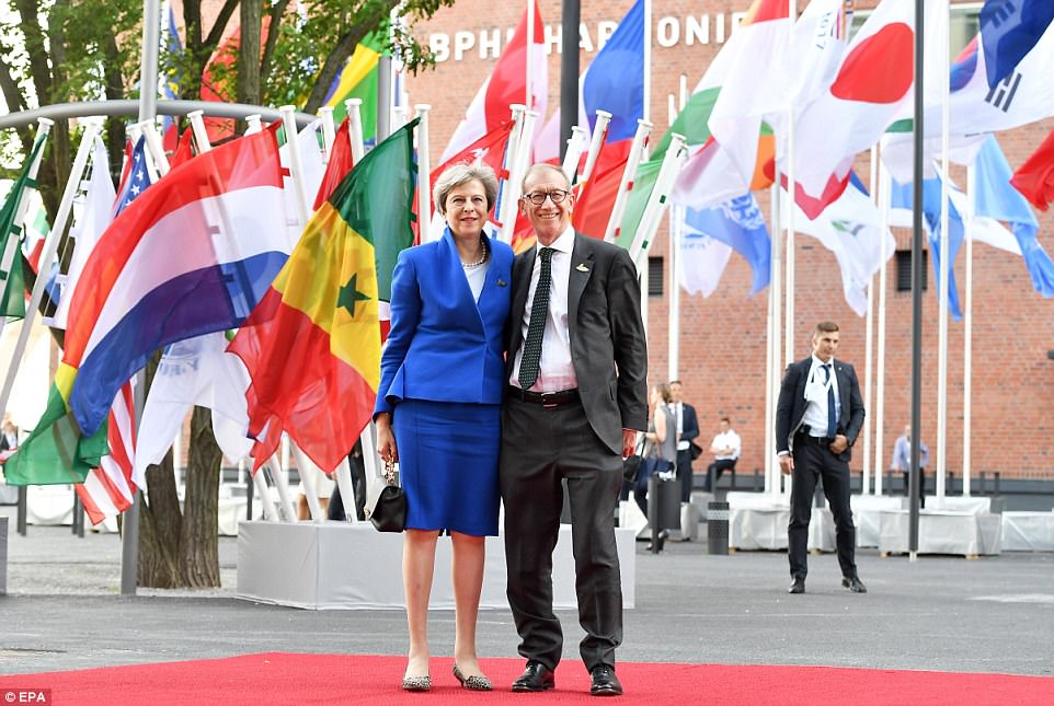 PM\'s husband Philip May lacks glamour of other G20 First Spouses