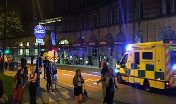 BREAKING: Manchester Arena - People flee Ariana Grande concert after reports of loud bangs BREAKING: Manchester Arena - People flee Ariana Grande concert after reports of loud bangs