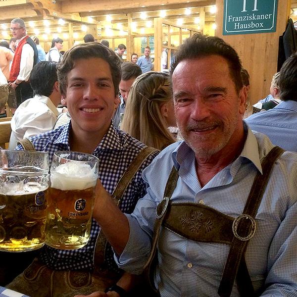 Arnold Schwarzenegger and Joseph Baena Take a Father-Son Trip to Oktoberfest