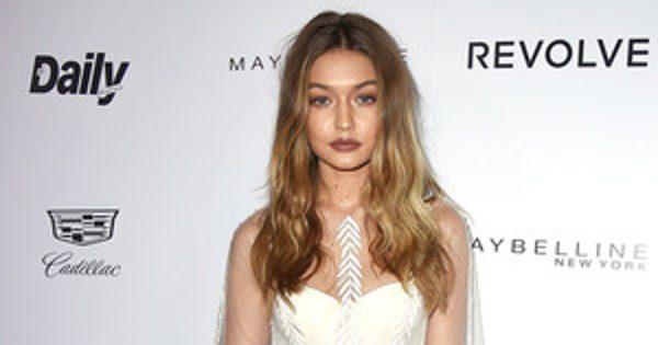 Gigi Hadid Stuns in Sheer Dress at Fashion Awards, But Why W