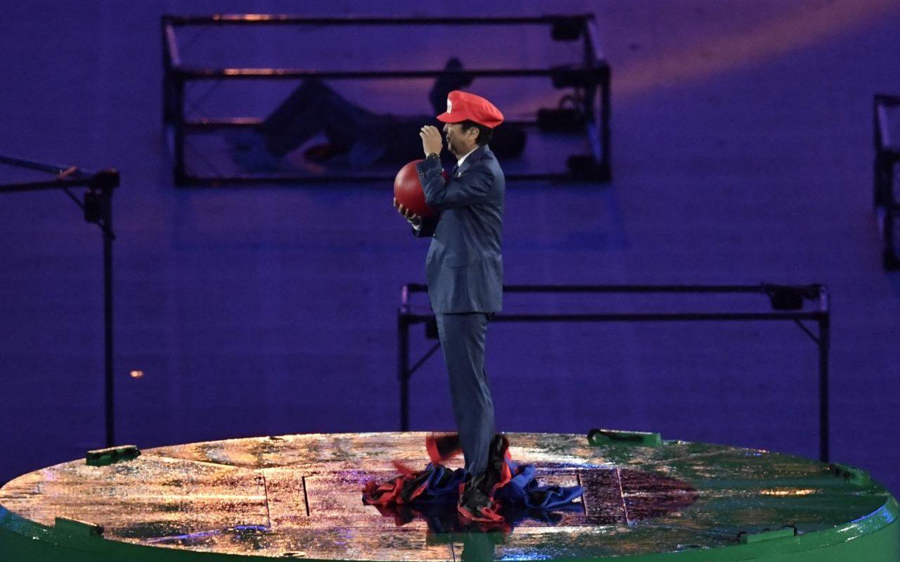 Japanese PM Shinzo Abe emerges from a green pipe disguised as Super Mario during Rio Closing Ceremony