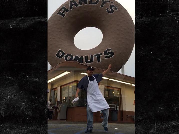 Justin Timberlake -- Randy's Donuts Employee Can't Stop The Feeling! (Video)