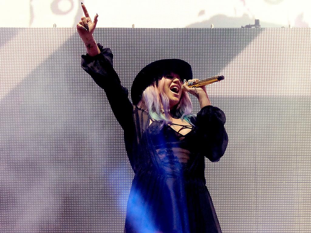 Kesha Parties at Neon Carnival After Performing with Zedd at