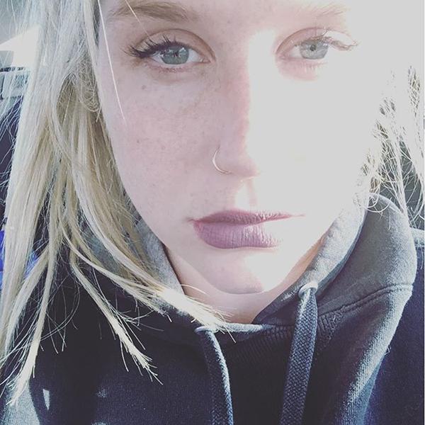 Kesha Puts Pen to Paper Amid Dr. Luke Legal Battle: 'I've Be