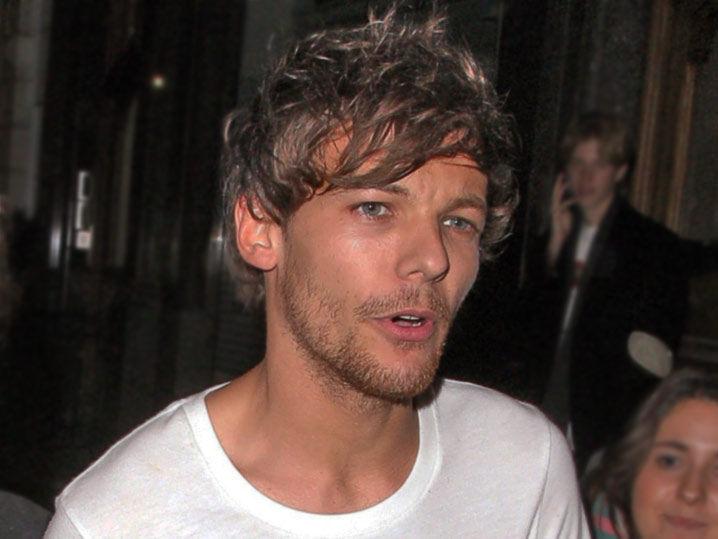 Louis Tomlinson Arrested for Attacking Paparazzo