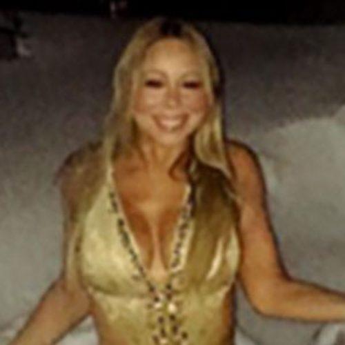 Mariah Carey Channels Glitter in Gold Swimsuit