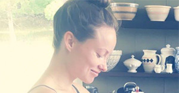 Olivia Wilde Shows Bare Baby Bump in a Bikini While Cooking