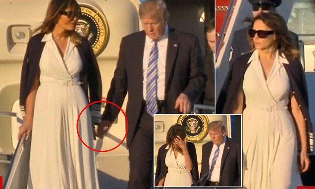 Melania dseplanes AF1 and pulls hand away from Donald in Florida