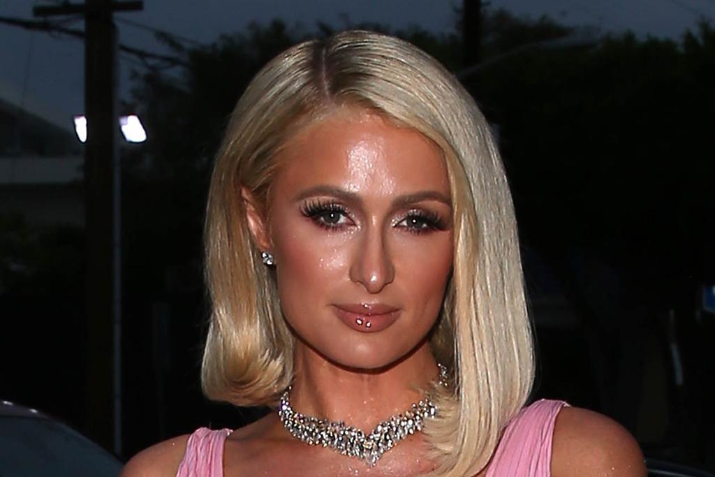 Paris Hilton Brings Back Glamour in a Plunging Pink Gown Satin Heels With a Bold Message