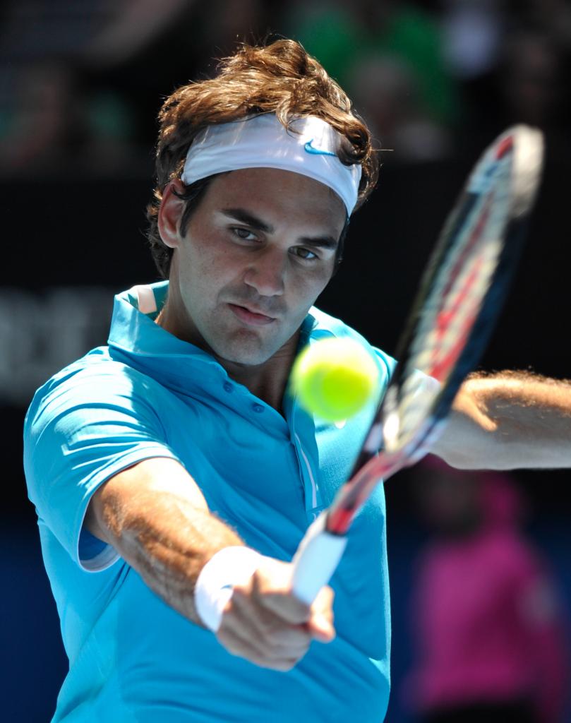 Australian Open Federer keeps his cool as heat of battle is fierce around him Kevin Mitchell