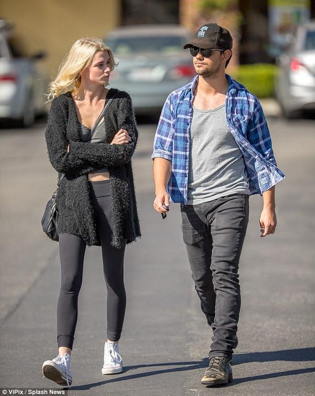 long! Taylor Lautner steps out with new model girlfriend Raina Lawson