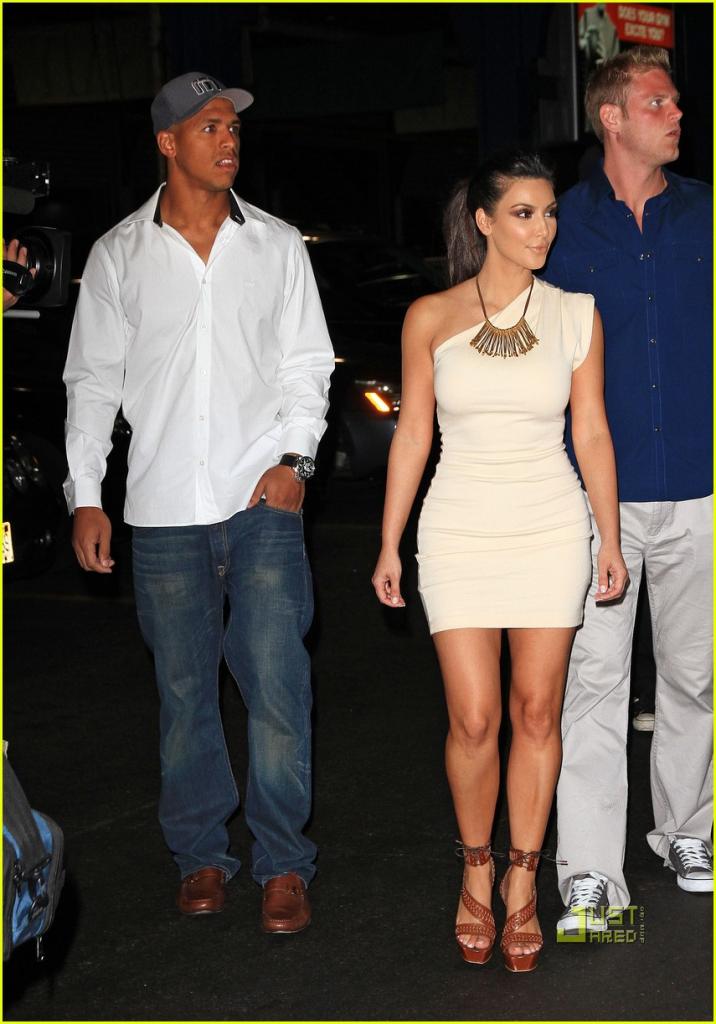 Kim Kardashian and Miles Austin take a walk to a yacht to celebrate