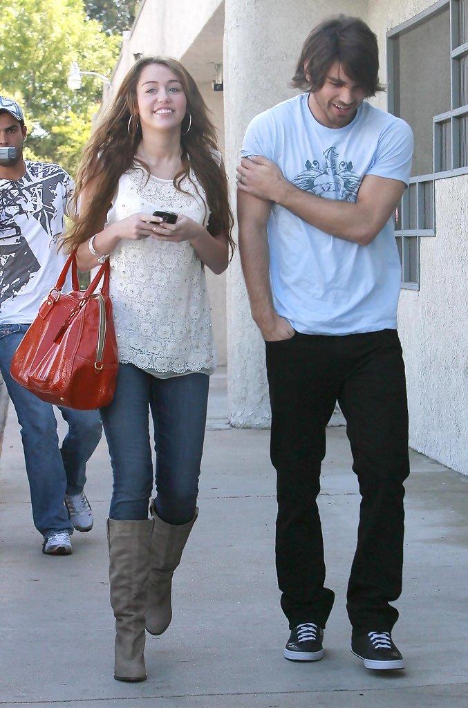 Miley Cyrus and Justin Gaston Photos Photos - Miley Cyrus And Justin