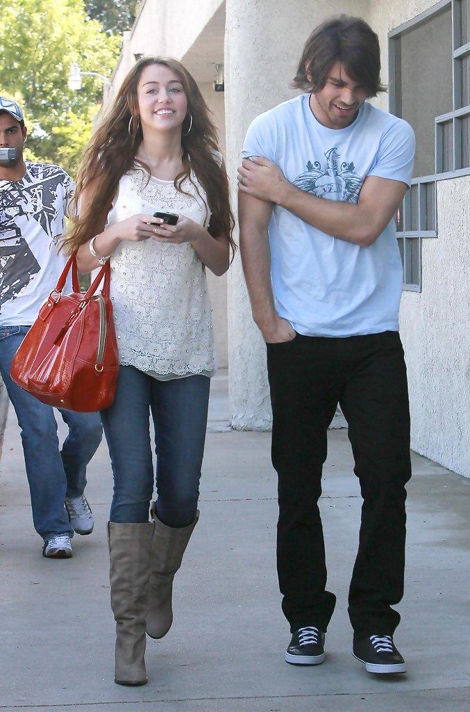 Miley Cyrus and Justin Gaston Photos Photos - Miley Cyrus And Justin