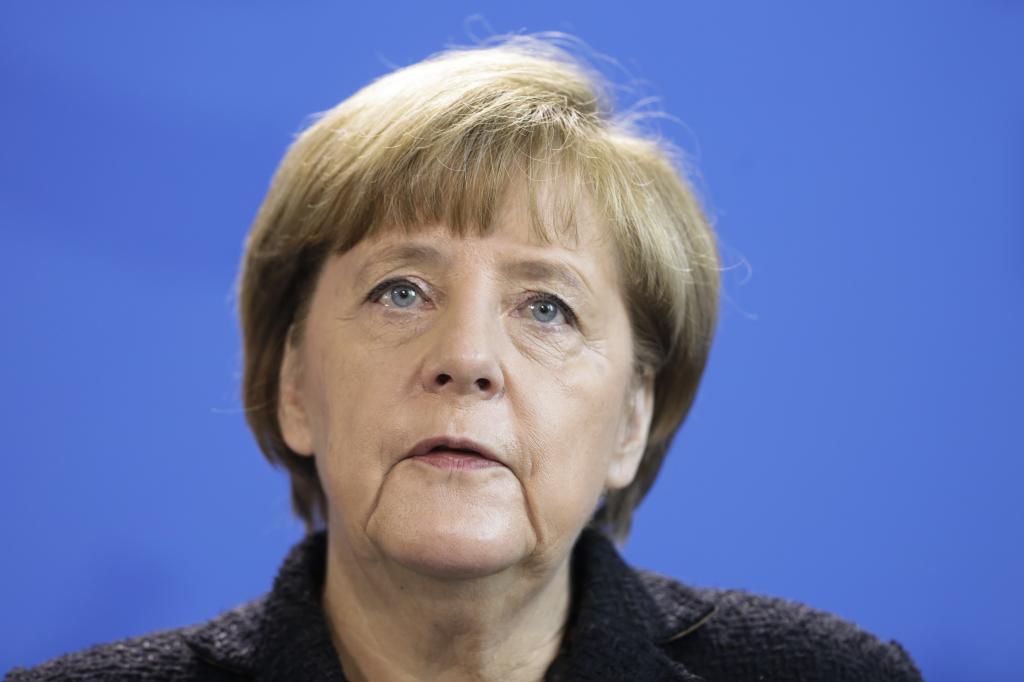 Angela Merkel On Defensive Over Germany's Refugee Policy, Spy