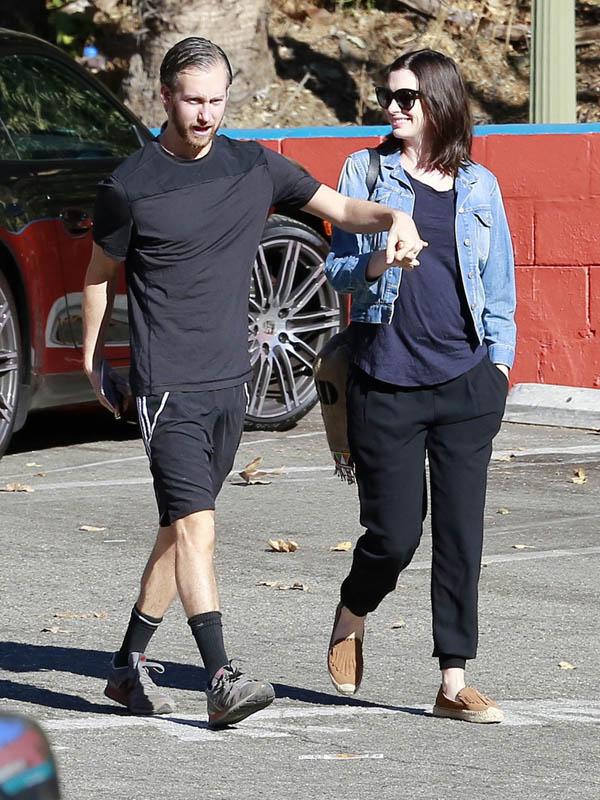 Anne Hathaway Smiles As She Steps Out With Husband Adam Shulman