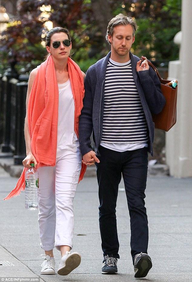 Anne Hathaway Wraps Up In A Coral Pashmina With Adam Shulman In NY