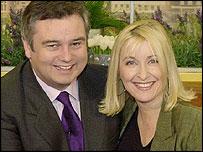 BBC NEWS   Entertainment   Holmes Bids Farewell To GMTV Sofa