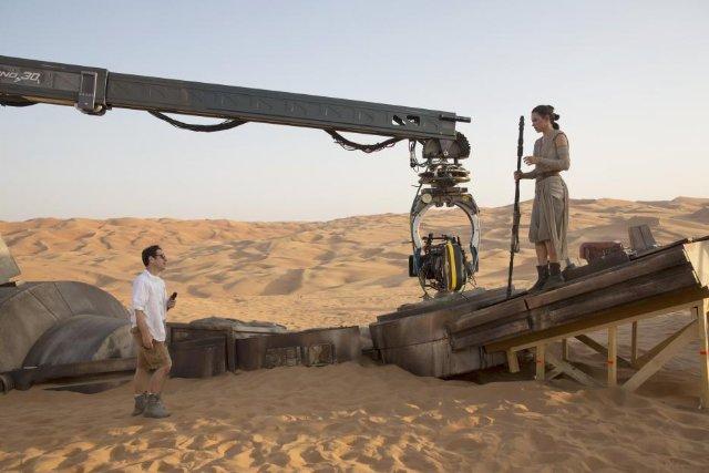 J.J. Abrams and Daisy Ridley in Star Wars: The Force Awakens