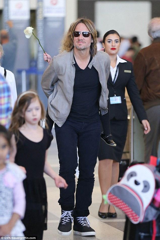 Keith Urban Gives Four-year-old Faith Margaret A Piggy-back Ride As