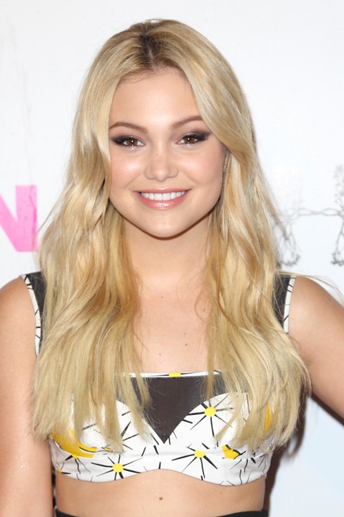 Olivia Holt Wavy Golden Blonde Dark Roots Hairstyle   Steal Her Style