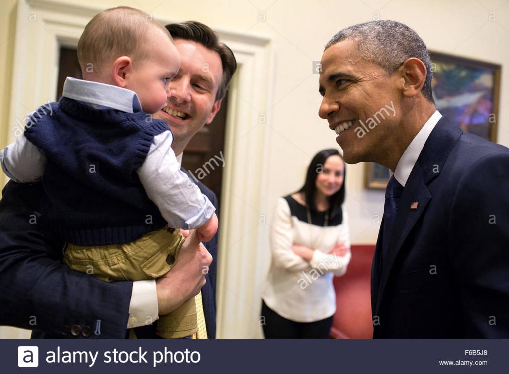President Barack Obama Greets Press Secretary Josh Earnest And His