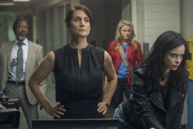 Still of Carrie-Anne Moss, Clarke Peters, Krysten Ritter and