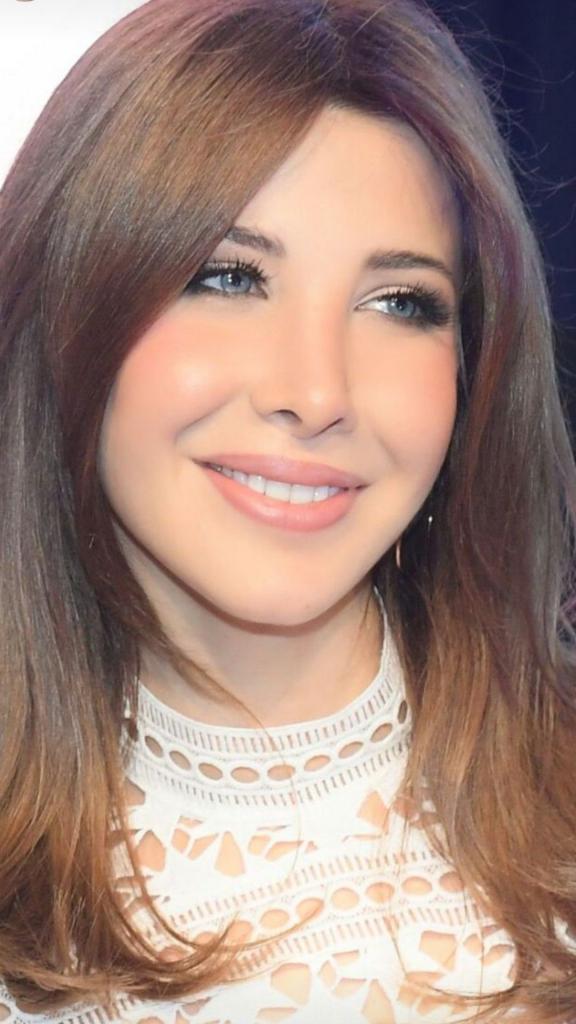 Pin by   is on   Nancy ajram, Beautiful face