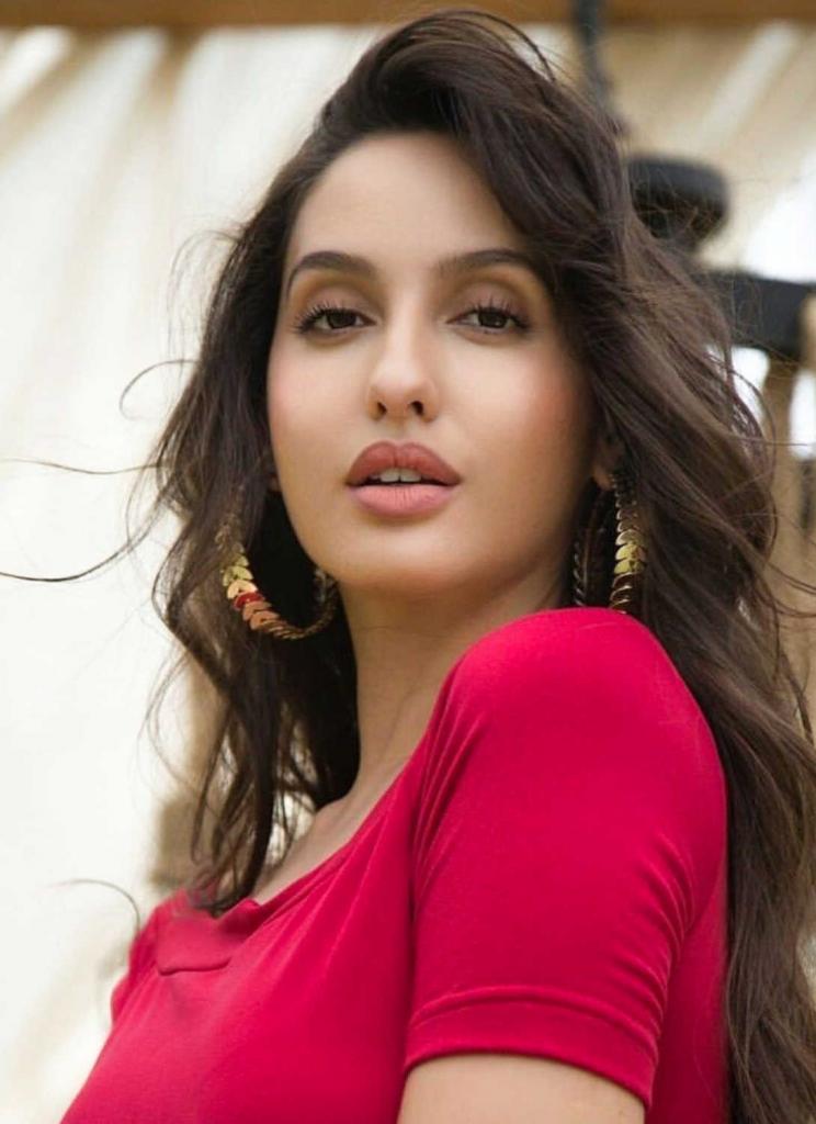 Nora Fatehi movies, filmography, biography and songs - Cinestaan.com