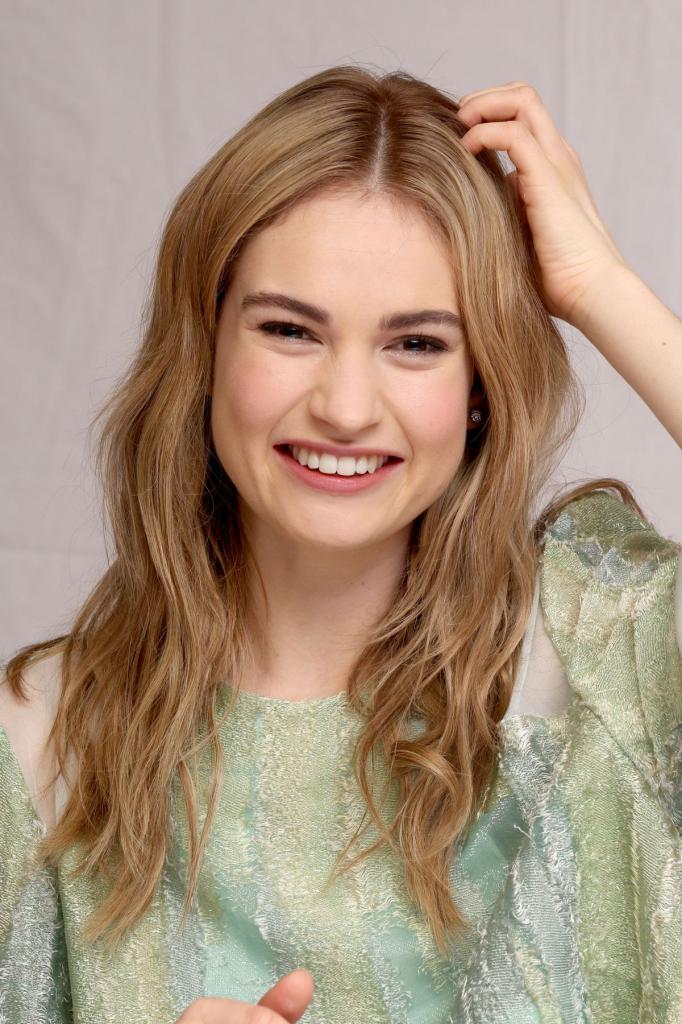 LILY JAMES at Cinderella Press Conference in Beverly Hills